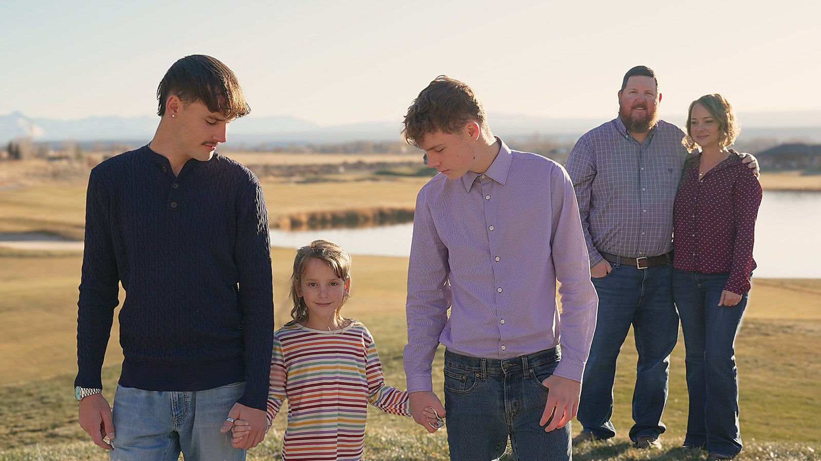 Family photoshoot on a golf course at golden hour — ModrnDayMedia